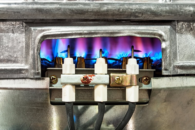 4 Factors to Consider When Buying a Heat Pump. Flames on a heat pump.